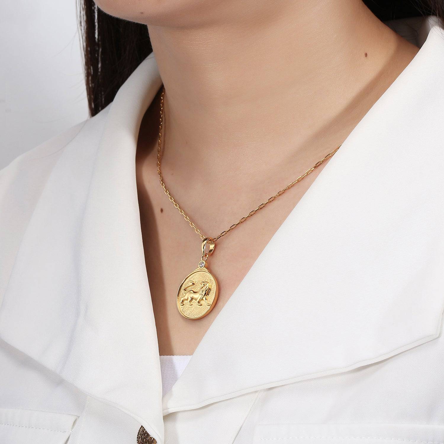 Gold Zodiac Necklace on a Model to show scale