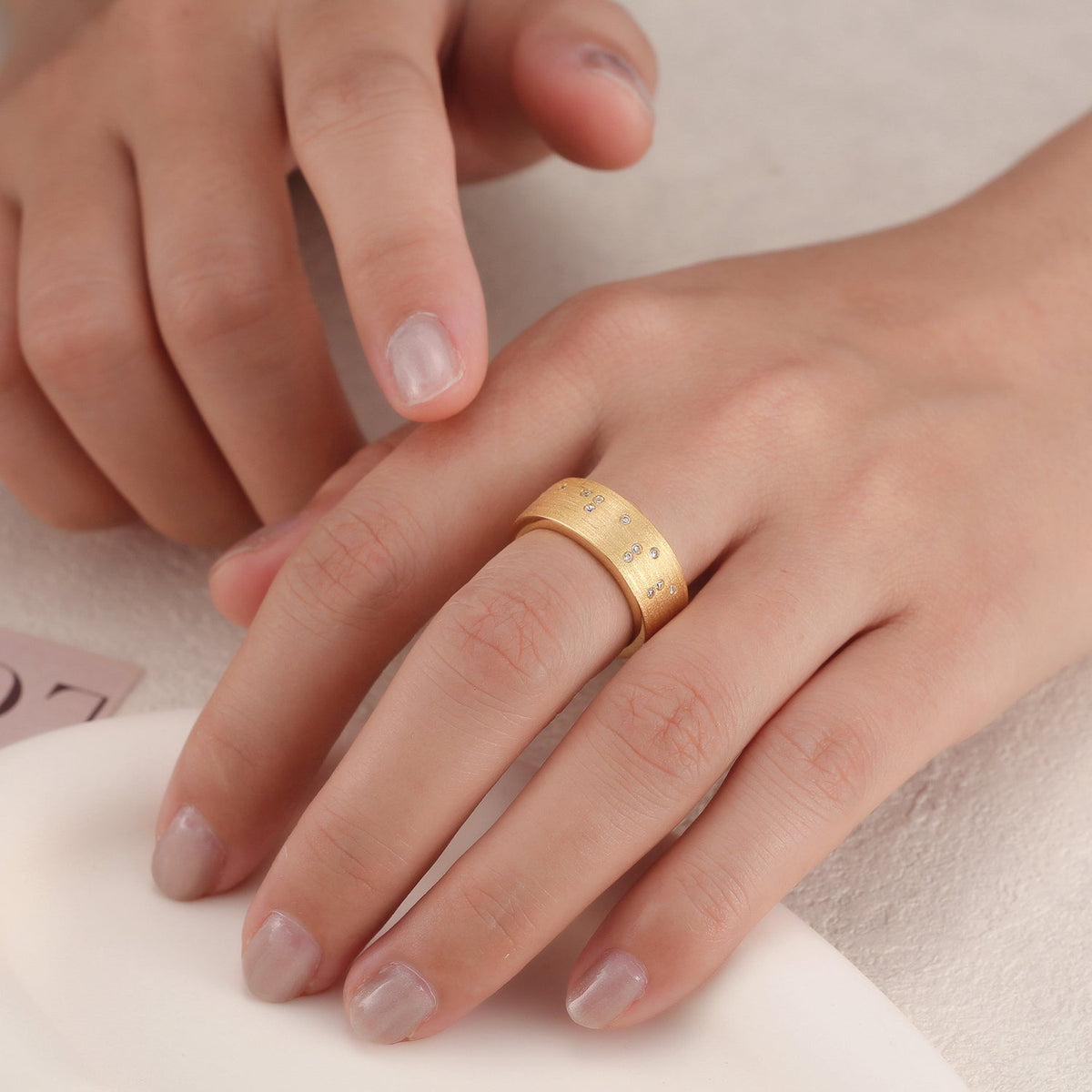 Touchstone Badass Braille Crystals Band Ring Brushed Gold on Model