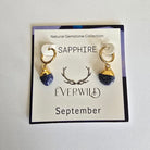 Sapphire  September birthstone earrings on a 'Everwild' branded card with a white background