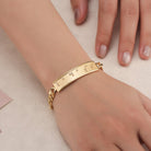 Touchstone Badass ID Link Bracelet in Gold with Braille Crystals on Model