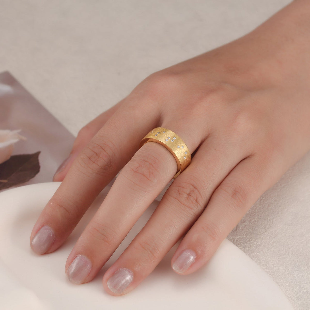 Touchstone 'Bestie' Band Ring Brushed Gold with Braille Crystals on Model