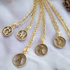 Saints and Saviors Dainty Fancy Initial Pendant Necklace A-Z several letters shown on a white background