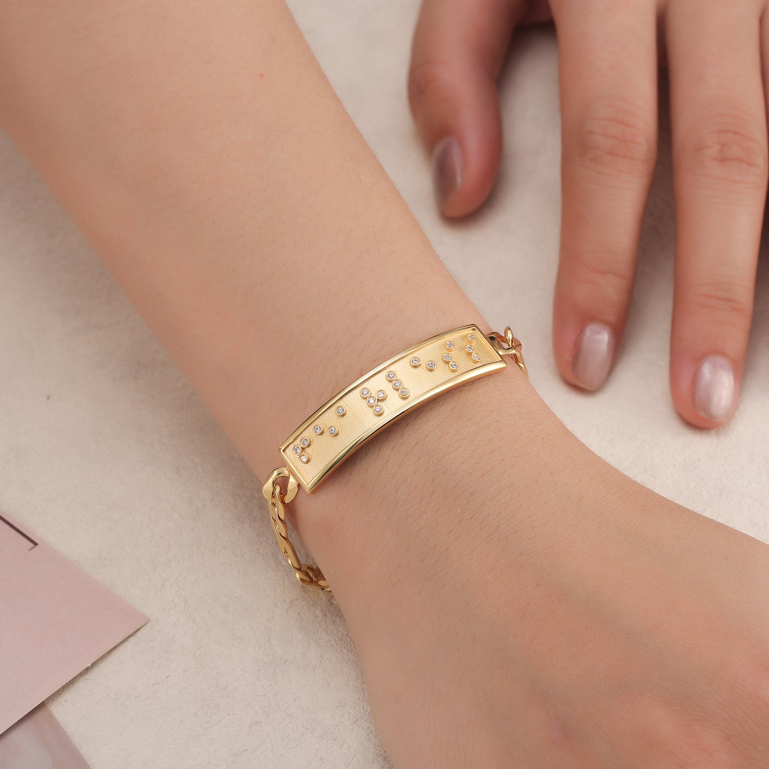 Touchstone Fearless ID Link Bracelet in Gold with Braille Crystals on Model