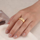 Touchstone HE>i Band Ring Brushed Gold Braille Crystals on Model's Hand