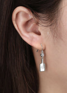 Pickleball Paddle Drop Silver Earrings on Model
