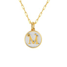 Saints and Saviors Dainty Fancy Initial Pendant Necklace gold letter M on small silver disc