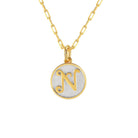 Saints and Saviors Dainty Fancy Initial Pendant Necklace gold letter N on small silver disc