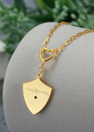 Saints and Saviors Gold Shield Crown Pendant Heart Necklace reverse