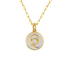 Saints and Saviors Dainty Fancy Initial Pendant Necklace gold letter Q on small silver disc