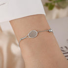 LoveMatch Tennis Ace Racquet and Ball on Silver chain bracelet on model