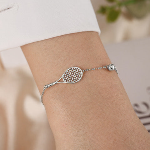 LoveMatch Tennis Ace Racquet and Ball on Silver chain bracelet on model