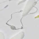 LoveMatch Tennis Ace Racquet and ball on silver chain Bracelet on white background