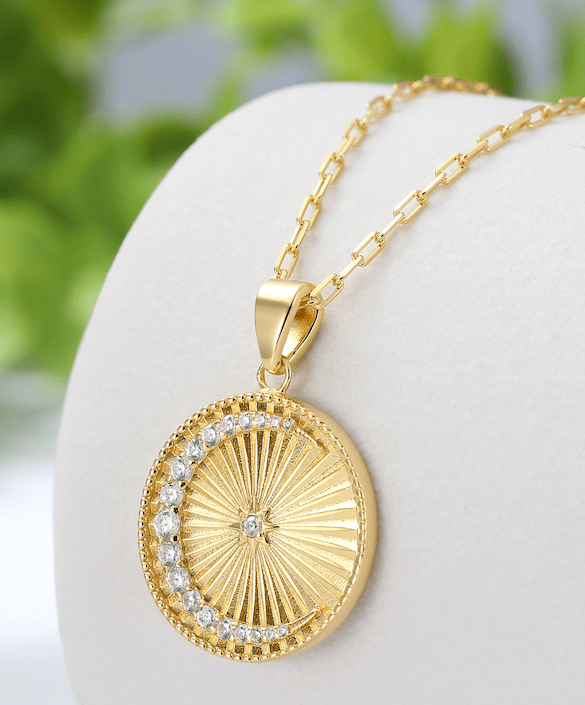 Saints and Saviors Over The Moon Pendant with Gold Sunburst and Moon in Clear Crystals Necklace