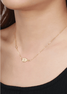 Pickleball The Dainty Dinker Starburst Gold Necklace on Model