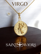 Gold Virgo Zodiac pendant necklace on a wooden surface