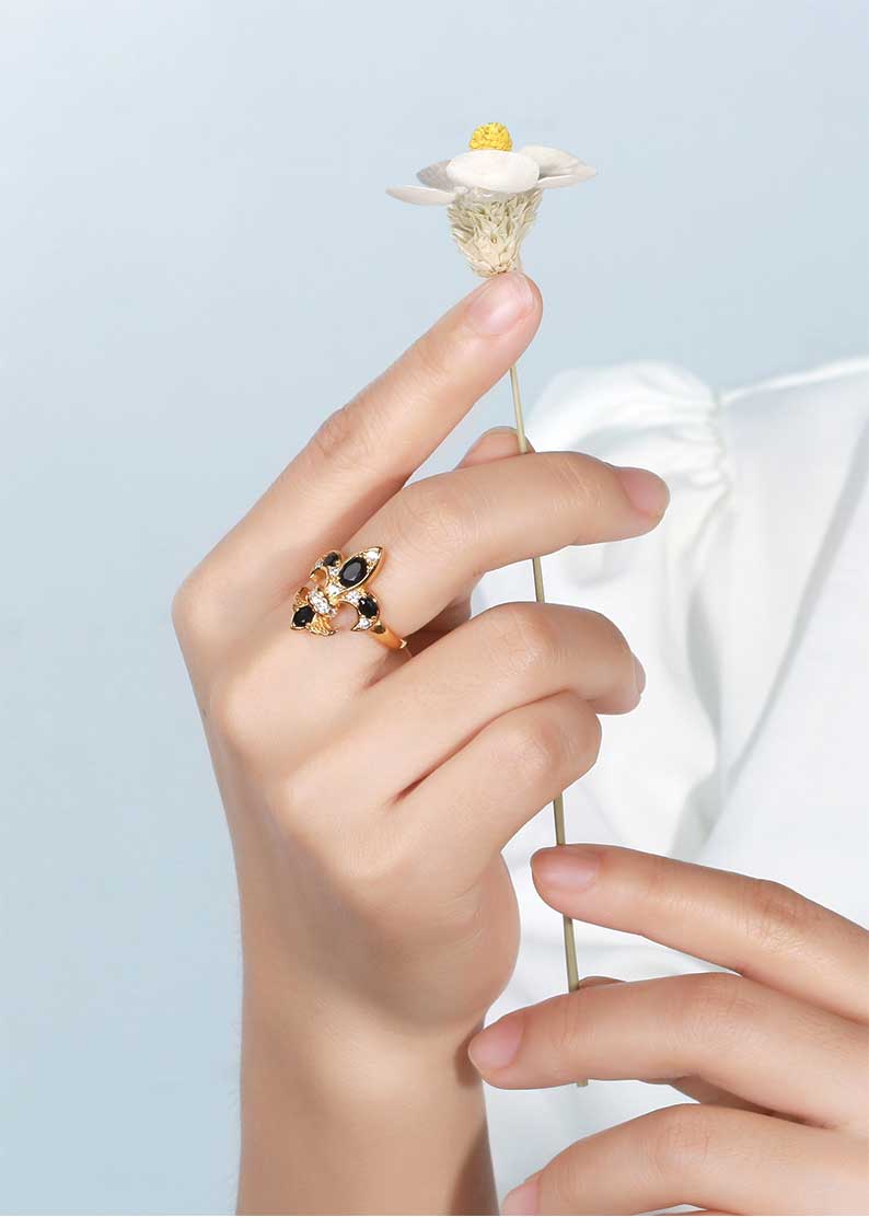 Saints & Saviors Gold Deni Fleur de Lis Onyx Ring on model