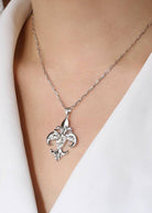 Saints and Saviors Fleur De Lis Silver Pendant Necklace on model