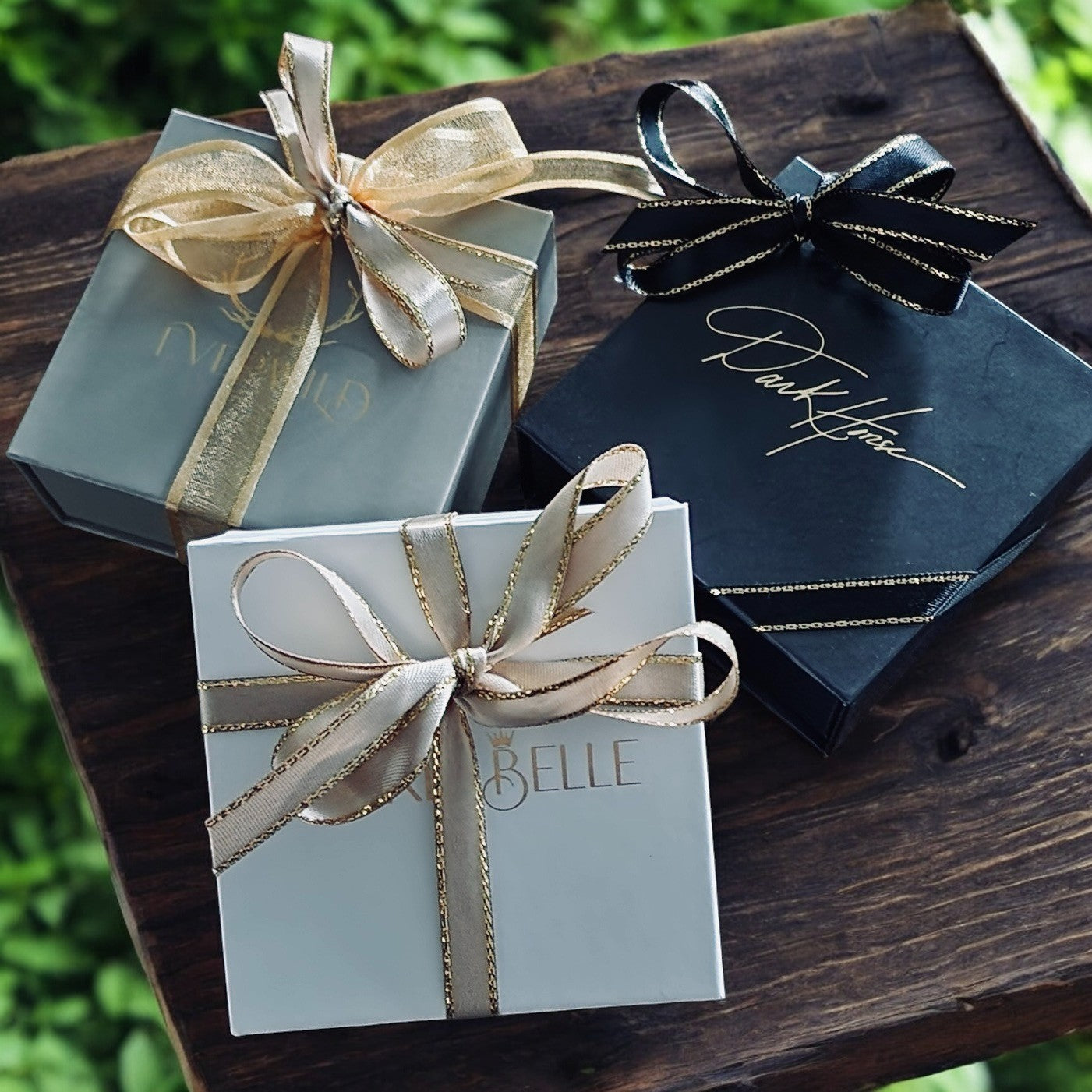 Three Gift Boxes with Ribbons