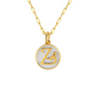 Saints and Saviors Dainty Fancy Initial Pendant Necklace gold letter Z on a small silver disc
